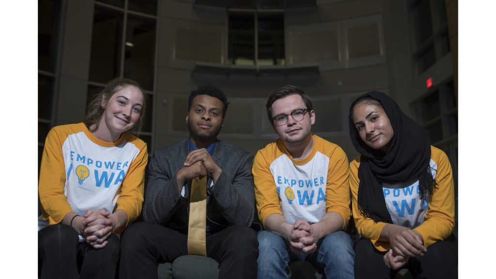 From left: Katherine Baer, Nate Robinson, Ben Nelson, and Zahra Aalabdulrasul, members of the UISG ticket Empower Iowa pose for portraits in the Adler Journalism Building on Monday, March 19, 2018. Empower Iowa is one of four groups on the ticket for the 2018-19 year UISG elections. (Ben Allan Smith/The Daily Iowan)