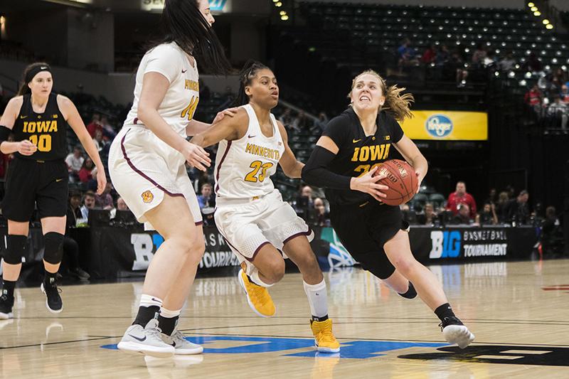 Iowa guard Kathleen Doyle drives to the hoop during the Iowa/Minnesota Big Ten tournament basketball game at Bankers Life Fieldhouse in Indianapolis on Friday, March, 2, 2018. The Golden Gophers defeated the Hawkeyes, 90-89. (Lily Smith/The Daily Iowan)