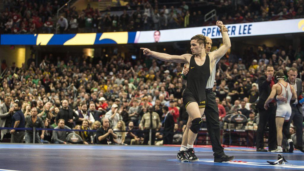 Iowas+Spencer+Lee+competes+against+Rutgerss+Nick+Suriano+in+the+125-pound+final+bout+of+the+NCAA+Wrestling+Championships+in+Cleveland%2C+OH.+Lee+defeated+Suriano+by+decision%2C+5-1%2C+placing+first+in+the+tournament.+This+is+Lees+first+national+title.+%28Ben+Allan+Smith%2FThe+Daily+Iowan%29
