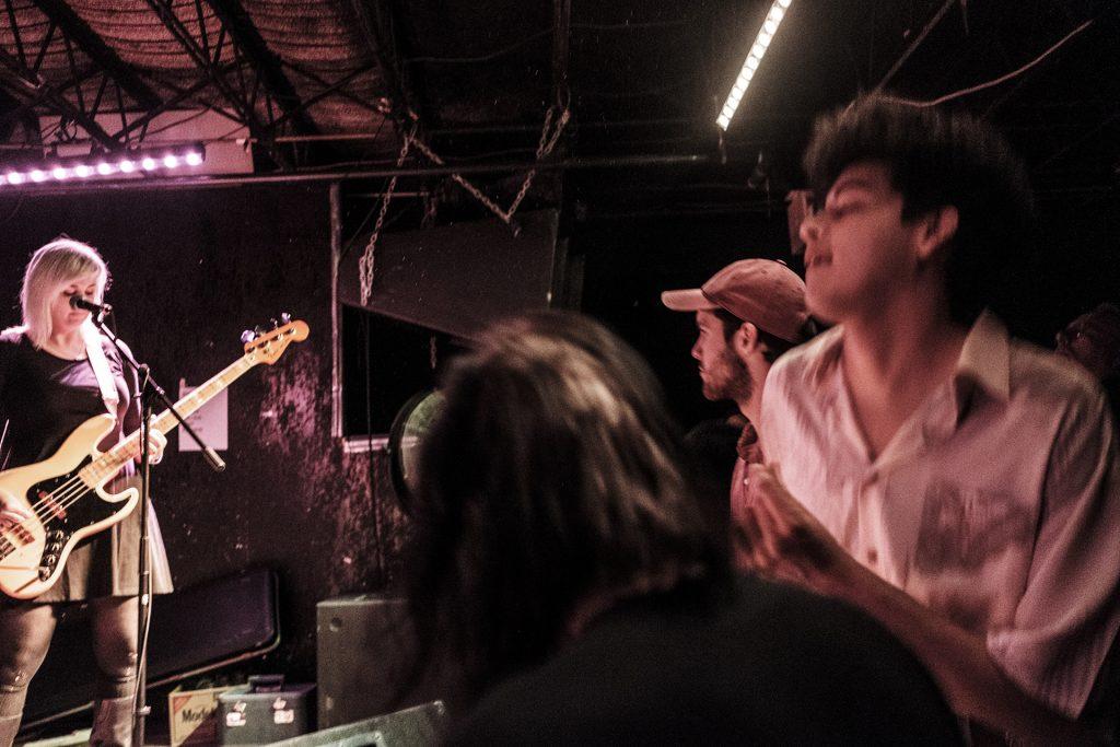 Concertgoers dance as Younger performs at Gabe’s in Iowa City on Wednesday, April 4, 2018. The show was one of a variety of events during the second day of the Mission Creek festival. (Nick Rohlman/The Daily Iowan)