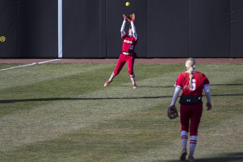 Wisconsin outfielder Gabby Scherle catches a ball during the Iowa/Wisconsin softball game at Bob Pearl Field  on Saturday, April 7, 2018. The Hawkeyes defeated the Badgers in the second game of the series, 4-3. (Lily Smith/The Daily Iowan)