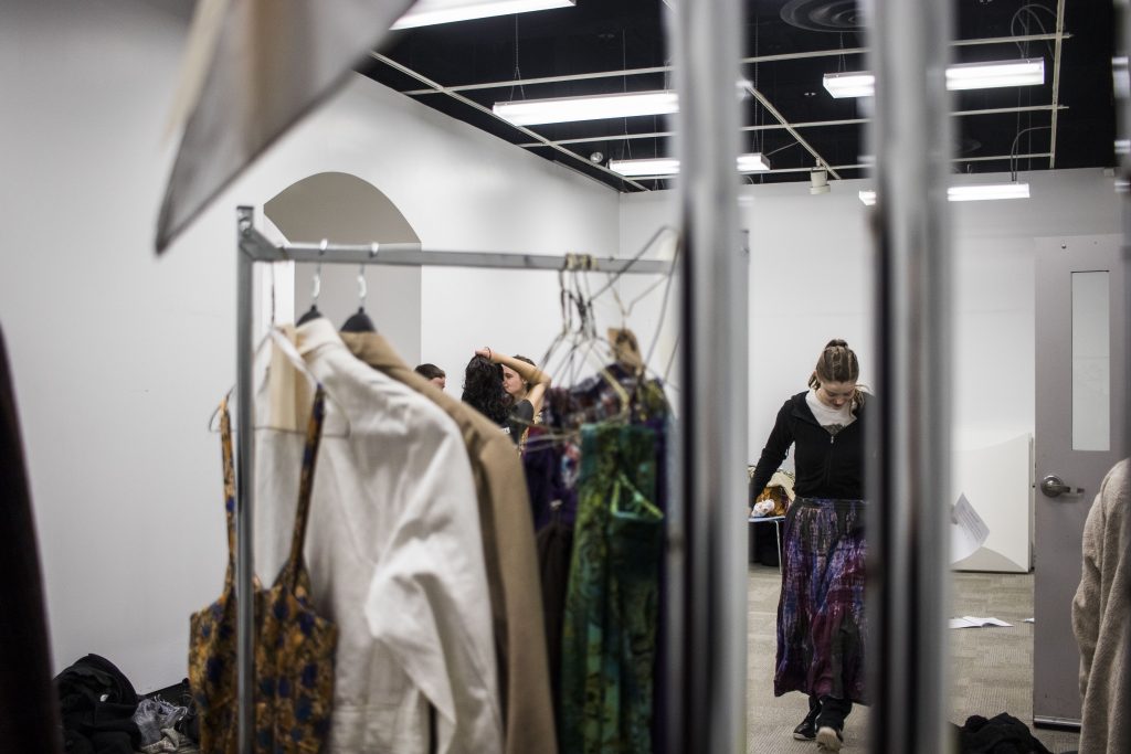 Maddie Voss tries on costumes during an A Midsummer Night's Dream rehearsal in the Old Museum of Art on Tuesday, March 6, 2018.