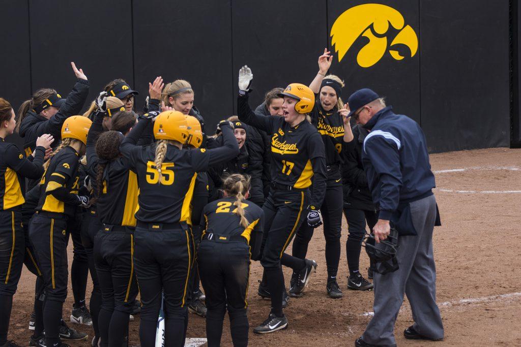 Iowa outfielder Allie Wood runs home during the Iowa/Wisconsin softball game at Bob Pearl Field  on Sunday, April 8, 2018. The Hawkeyes defeated the Badgers in the third game of the series, 5-3. (Lily Smith/The Daily Iowan)