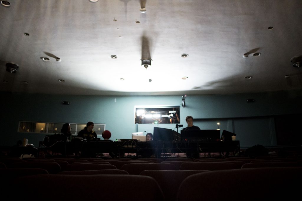 The tech crew tests house lighting during an A Midsummer Night's Dream dress rehearsal in the E.C. Mabie theatre in the Theatre Building on Monday, April 16, 2018. (Lily Smith/The Daily Iowan)