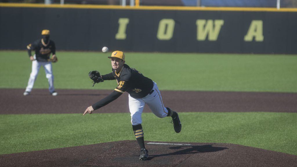 Freshman Trenton Wallace pitches during mens baseball Iowa vs Grand View on Apr 4, 2018 at Duane Banks Field. The Hawkeyes defeated the Vikings 4-2. (Katie Goodale/The Daily Iowan)