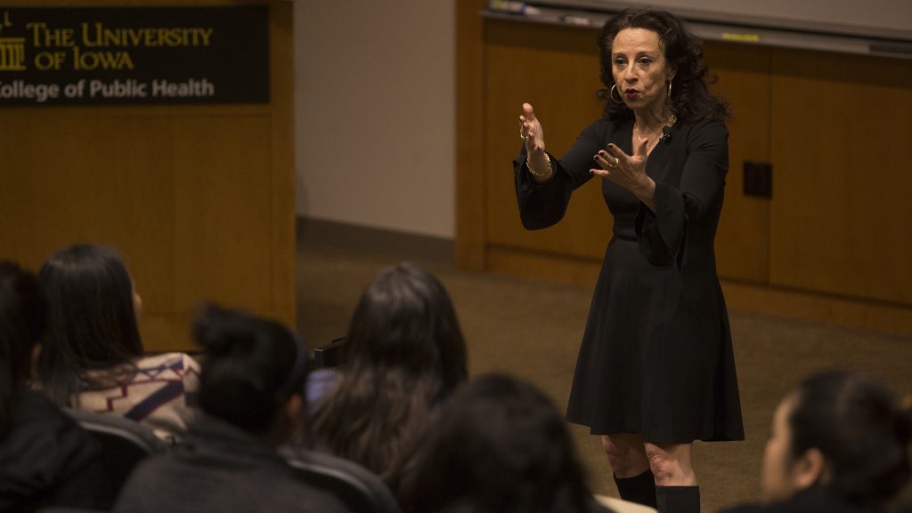 Journalist Maria Hinojosa addresses the audience on Apr. 2, 2018 at the Callaghan Auditorium in the College of Public Health. Hinojosa discussed lack of opportunities for people of color and the effects of racism on modern culture. (Katie Goodale/The Daily Iowan)