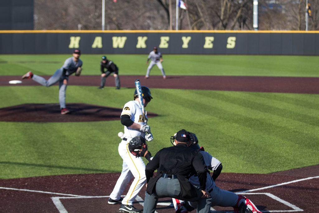 Tyler+Cropley+gets+hit+by+a+pitch+during+Iowa+baseball+vs.+Northern+Illinois+at+Banks+Field+on+April+17%2C+2018.+The+Hawkeyes+won+the+game+2-0.+%28Megan+Nagorzanski%2FThe+Daily+Iowan%29