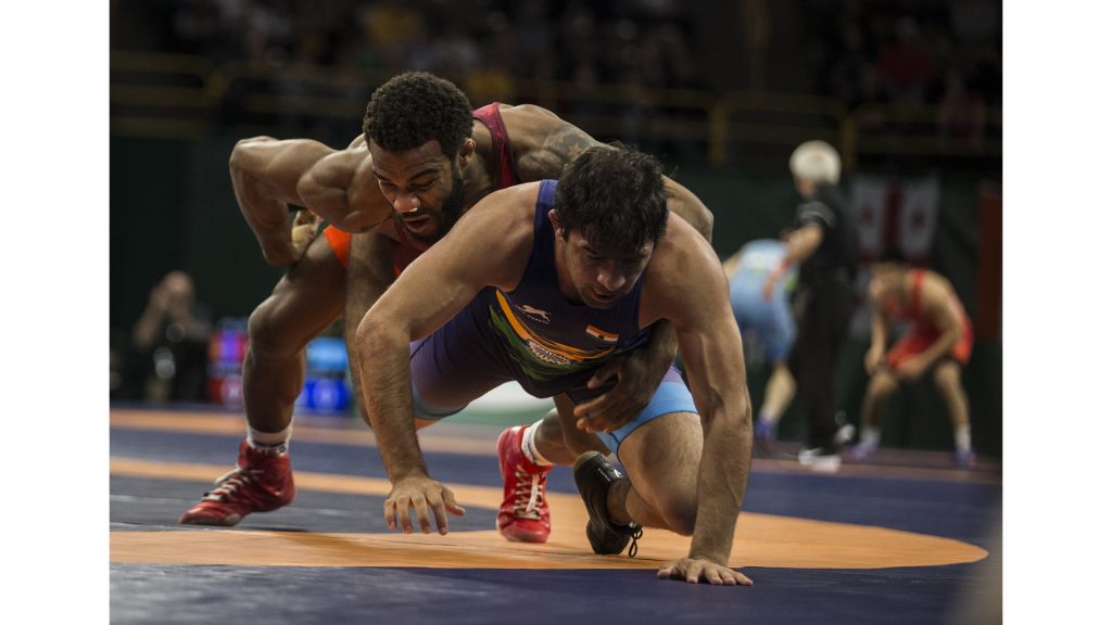 Jordan+Burroughs+%28red%29+of+America+competes+against+Vinod+Kumar+Omprakash+%28blue%29+of+India+in+the+74+kg+bout+during+the+2018+Mens+Freestyle+World+Cup+at+Carver-Hawkeye+Arena+on+Saturday%2C+April+7.+%28Ben+Allan+Smith%2FThe+Daily+Iowan%29