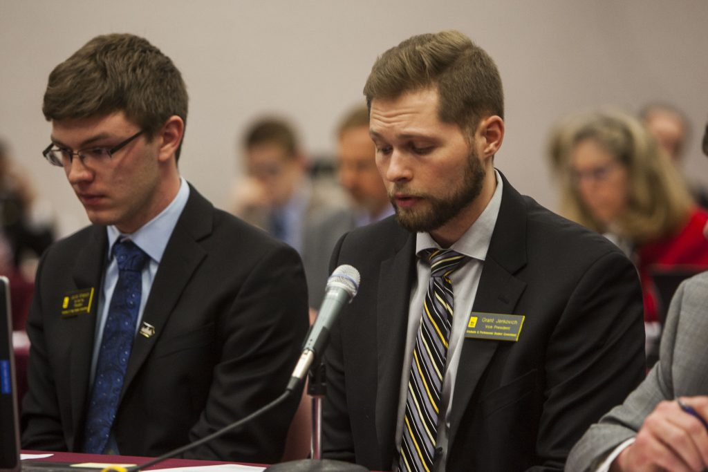 UISG President Jacob Simpson and GPSG Vice President Grant Jerkovich speak to the state Board of Regents about the effect of tuition increases on the student body on Thursday, April 12, 2018 at the Iowa School for the Deaf in Council Bluffs. (Emily Wangen/The Daily Iowan)