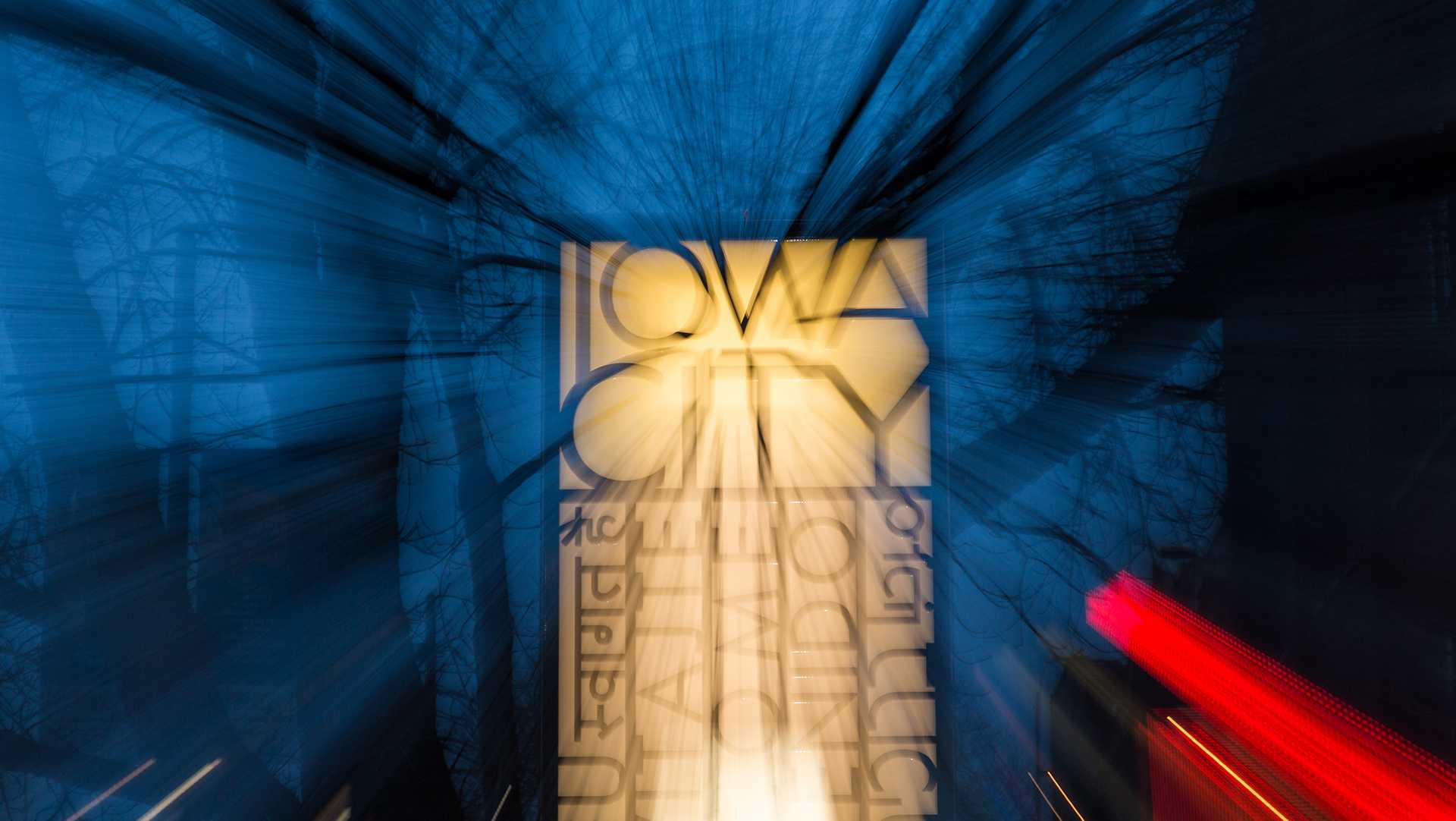 Signs in downtown Iowa City pay homage to its status as a UNESCO City of Literature. Iowa City is the host for the 2018 annual meeting of the UNESCO Cities of Literature. Apr. 2, 2018 (David Harmantas/The Daily Iowan)