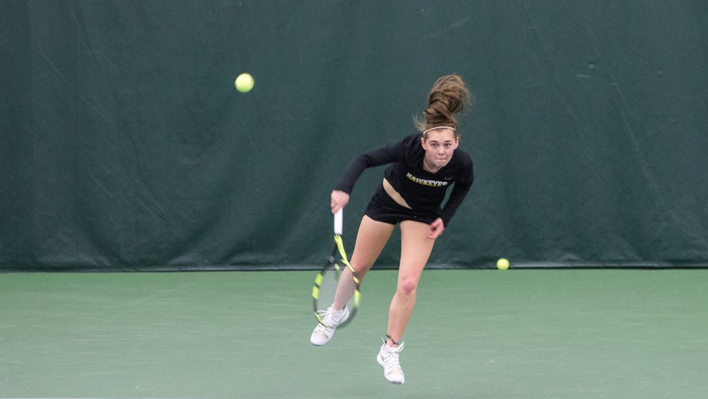 Iowa tennis player Zoe Douglas returns the ball during a match against Marquette University on Sunday, Feb. 25, 2018 at the Hawkeye Tennis Complex. Iowa swept the match and Douglas won her match 6-3, 6-3. (David Harmantas/The Daily Iowan)