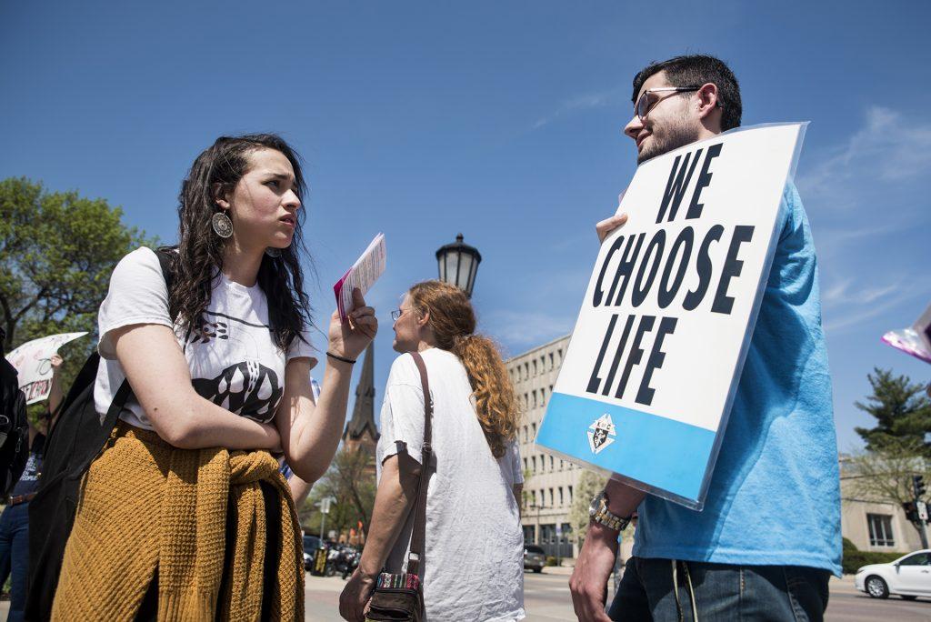Opposing protestors discuss Iowas heartbeat bill on May 5, 2018. 