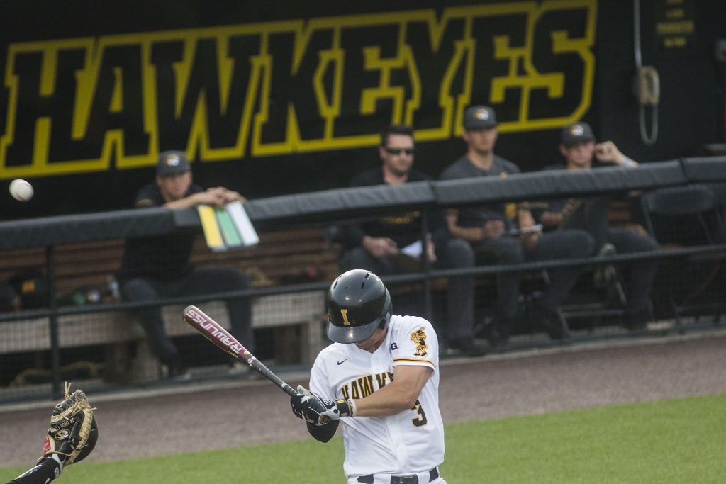 Iowa's Matt Hoeg reacts to getting hit by a pitch during the Iowa/Mizzou baseball game at Duane Banks Field on Tuesday, May 1, 2018. The Tigers defeated the Hawkeyes, 17-16, with two extra innings. (Lily Smith/The Daily Iowan)