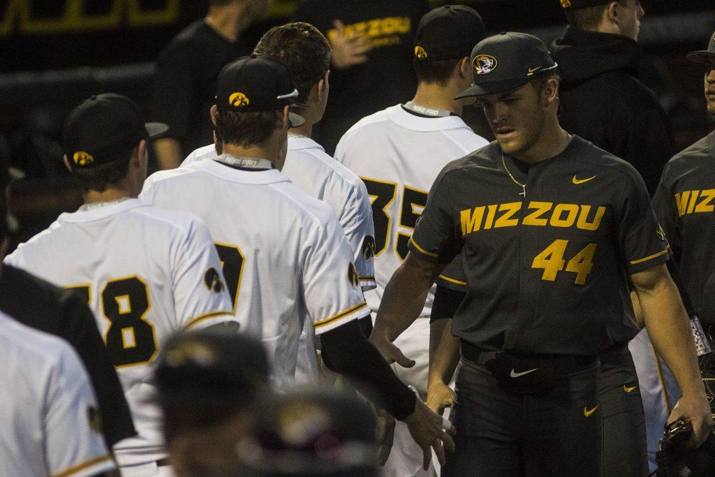 Iowa and Mizzou players shake hands during the Iowa/Mizzou baseball game at Duane Banks Field on Tuesday, May 1, 2018. The Tigers defeated the Hawkeyes, 17-16, with two extra innings. (Lily Smith/The Daily Iowan)