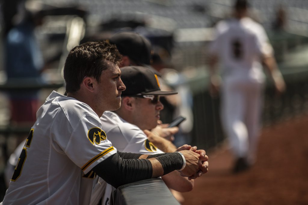 Iowa+players+lean+on+the+dugout+railing+after+Iowas+Big+Ten+tournament+game+against+Ohio+State+on+Thursday%2C+May+24%2C+2018.+The+Buckeyes+defeated+the+Hawkeyes+2-0.+%28Nick+Rohlman%2FThe+Daily+Iowan%29