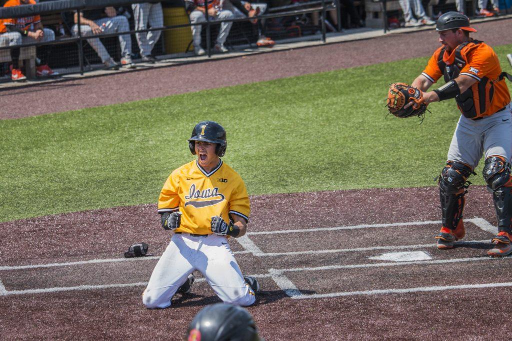 Iowa infielder Mitchell Boe celebrates after hitting a home run during baseball Iowa vs. Oklahoma State at Duane Banks Field on May 6, 2018. The Hawkeyes defeated the Cowboys 11-3.  (Katina Zentz/The Daily Iowan)