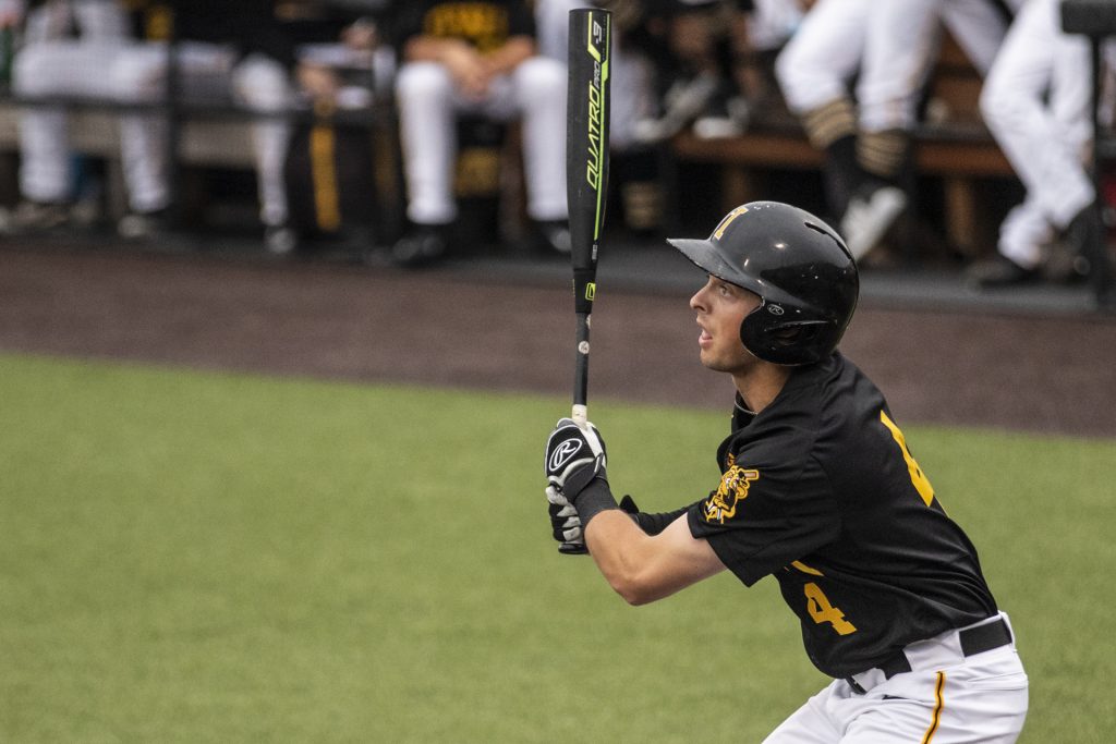 Iowas+Mitchell+Boe+watches+as+the+ball+bounces+off+the+wall+for+a+double+during+the+NCAA+baseball+game+between+Iowa+and+Penn+State+at+Duane+Banks+Field+on+Friday%2C+May+18.+The+Hawkeyes+defeated+the+Nittany+Lions+9-1.+%28Nick+Rohlman%2FThe+Daily+Iowan%29