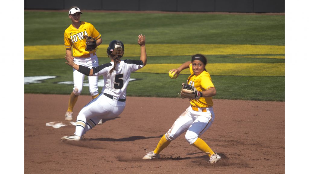 Lea+Shaw+throws+to+first+base+during+Iowas+game+against+Purdue+at+Pearl+Field+on+May+5%2C+2018.+The+Hawkeyes+were+defeated+9-0.+%28Megan+Nagorzanski%2FThe+Daily+Iowan%29