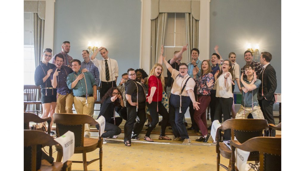 All graduating seniors that participated in the Rainbow Graduation pose after the event on Tue. May 8, 2018 held in the Old Capitol Senate Chamber. The Rainbow Graduation allows LGBTQ students to celebrate their graduation as a group. (Katie Goodale/The Daily Iowan)