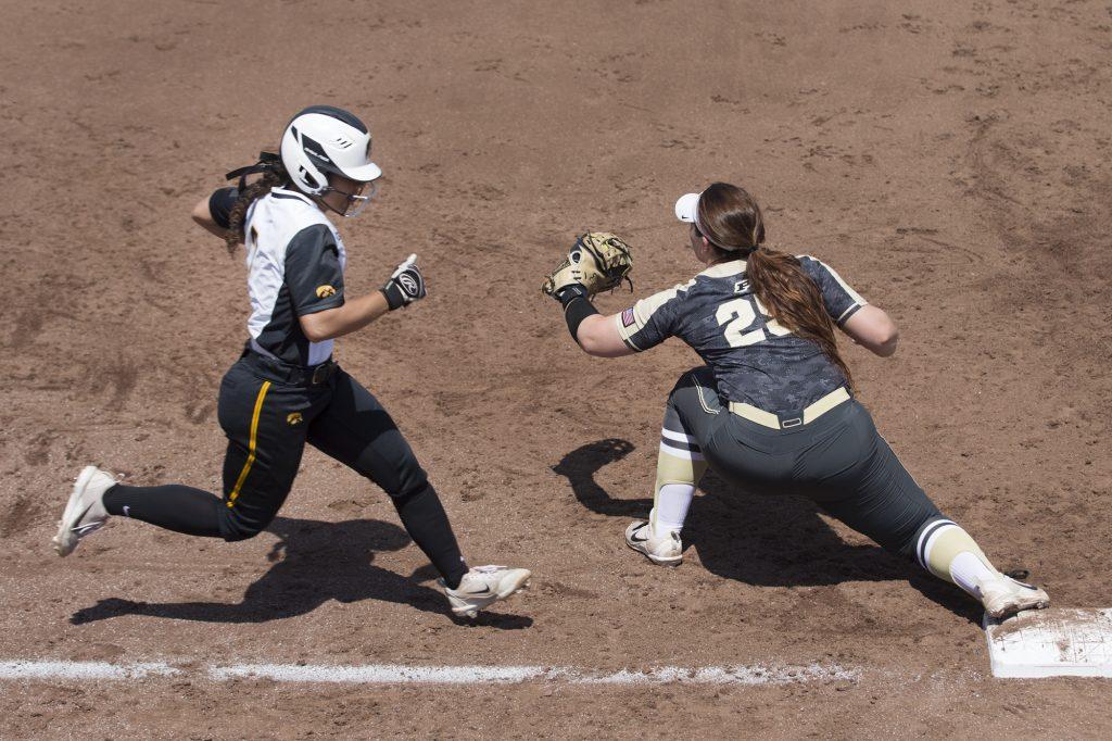 Iowas Lea Thompson is tagged out by Purdues Lexi Huffman during a softball game between Iowa and Purdue on Sunday, May 6, 2018. The Boilermakers spoiled the Hawkeyes senior day, 6-0. (Shivansh Ahuja/The Daily Iowan)