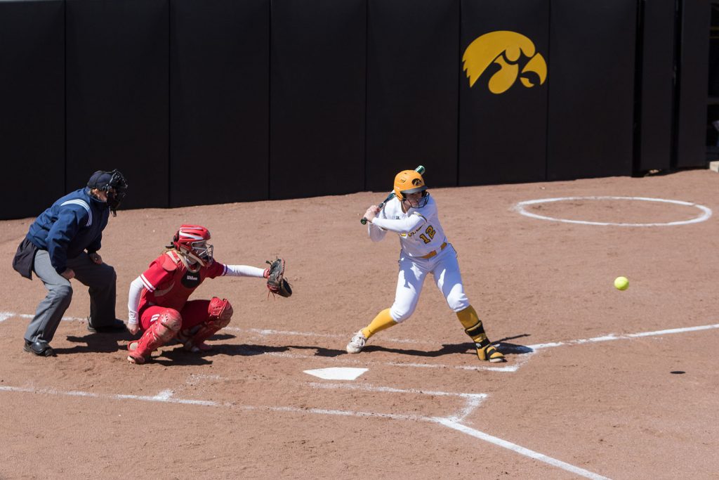 University of Iowa softball player Angela Schmiederer watches a pitch during a game against the University of Wisconsin on Saturday, Apr. 7, 2018. The Hawkeyes defeated the Badgers 3-0. (David Harmantas/The Daily Iowan)
