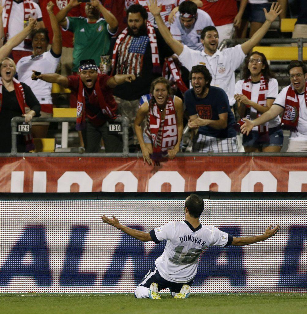 Landon Donovan of the United States celebrates after scoring against Mexico in the second half during 2014 FIFA World Cup Qualifying at Columbus Crew Stadium in Columbus, Ohio, on Tuesday, Sept. 10, 2013. Donovan is encouraging Americans to root for Mexico in the World Cup, after the U.S. failed to qualify. (Kyle Robertson/Columbus Dispatch/TNS)