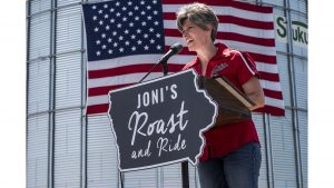 Sen. Joni Ernst, R-Iowa, speaks during the fourth annual Roast and Ride fundraiser in Boone, Iowa on Saturday, June 9, 2018. The event raises money for veterans charities and provides a platform for state and national Republican officials to speak. 