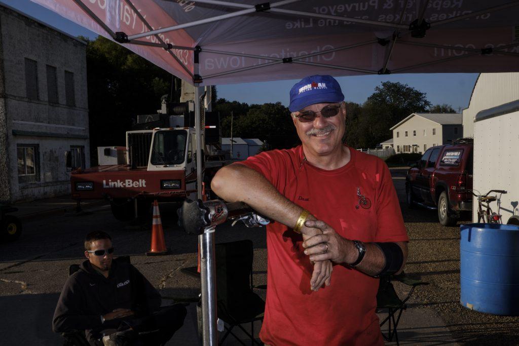 Dave Hendricks poses for a portrait in Wellman, Iowa during RAGBRAI on Friday, July 27, 2018. Dave owns the Connecticut Yankee Pedaller bike shop in Cheriton. 2018 is his ninth year providing maintenance along the RAGBRAI route. Riders rode from Sigourney to Iowa City on Day 6 of this years ride. Riders rode from Sigourney to Iowa City on Day 6 of this years ride. (Nick Rohlman/The Daily Iowan)