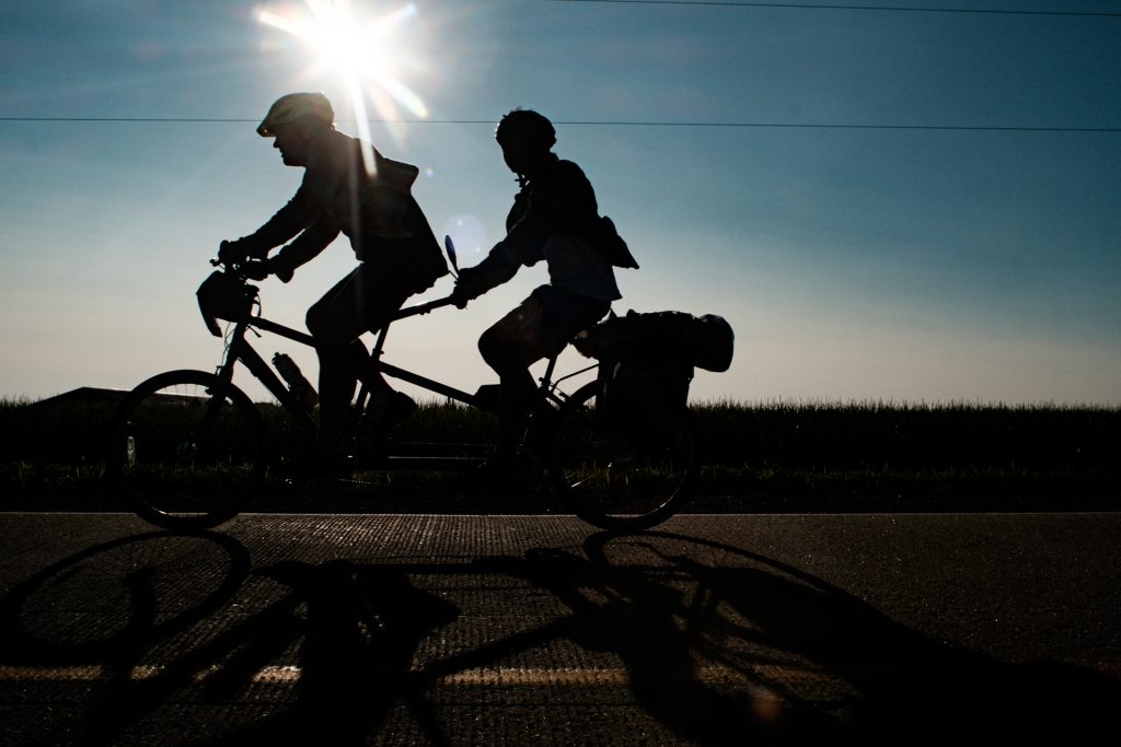 Riders on a tandem bike just outside Wellman, Iowa rode from Sigourney to Iowa City on Day 6 of this years RAGBRAI, Friday, July 27th, 2018. (Jared Krauss/The Daily Iowan)