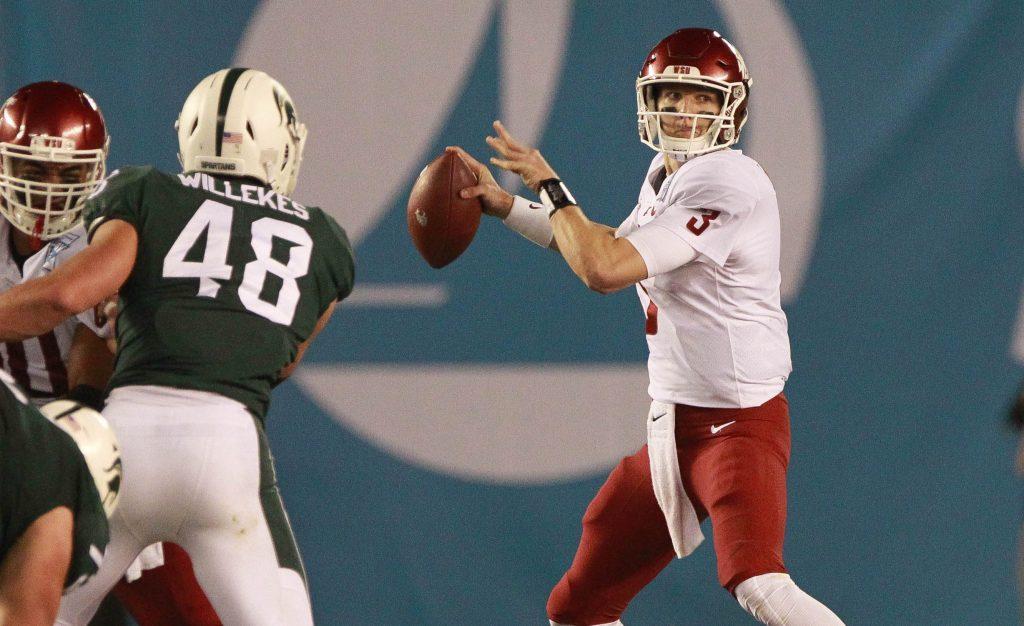 Washington State quarterback Tyler Hilinski, right, looks to pass against Michigan State during the Holiday Bowl at SDCCU Stadium in San Diego on Dec. 28, 2017. (Hayne Palmour IV/San Diego Union-Tribune/TNS)