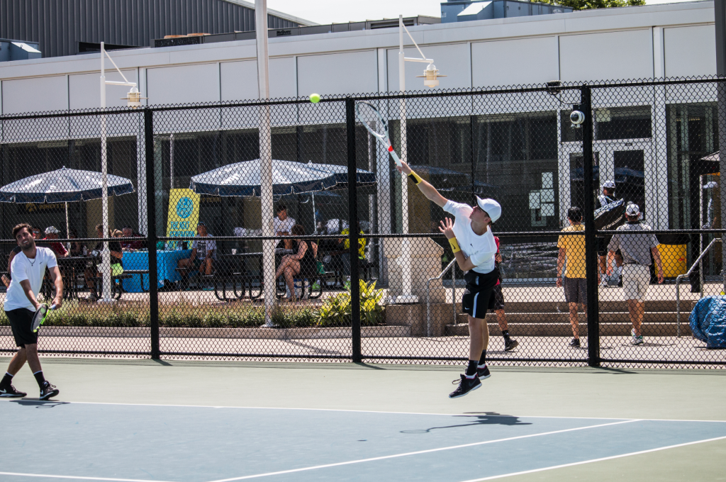 UI junior Jason Kerst serves the ball during the professional tennis tournament at the Hawkeye Tennis and Recreation Complex on July 17, 2018. (Katina Zentz/The Daily Iowan)