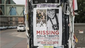 Missing posters for UI student Mollie Tibbetts are seen in Iowa City on Sunday, July 29, 2018. Tibbetts went missing between July 18 and 19, in Brooklyn, Iowa.