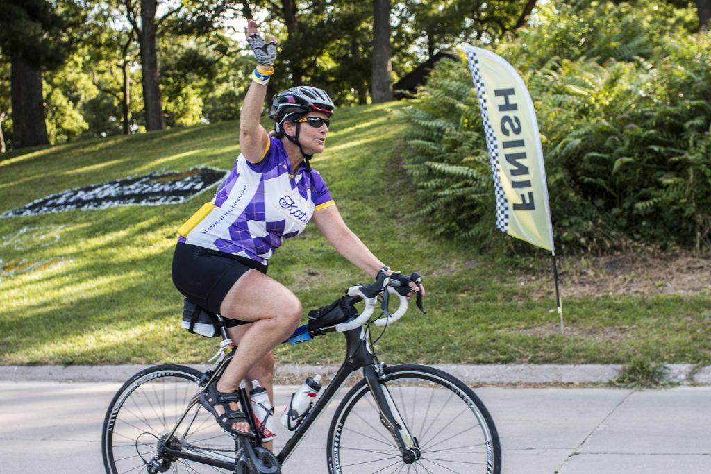 A biker rides through the finish line in Iowa City's City Park during RAGBRAI on July 27, 2018. Riders rode from Sigourney to Iowa City on Day 6 of this year's event. (Katina Zentz/The Daily Iowan)