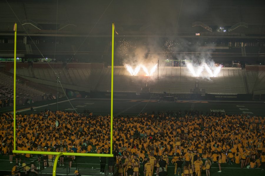 Fireworks are light to commemorate kickoff during Kickoff at Kinnick in Kinnick Stadium located in Iowa City on Aug. 17, 2018. During this OnIowa event, students were able to rush the field, listen to music, learn the fight song, and watch fireworks.