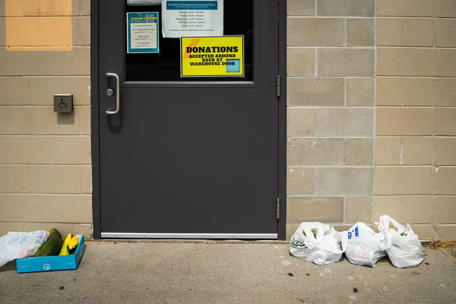 Donations sit outside the door to the Food Bank for the Crisis Center of Johnson Coutny on Sunday, Aug. 19, 2018. The Food Bank allows Johnson County residents to accept grocery assistance once per week.