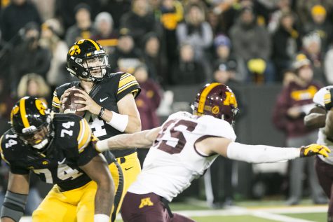 Iowa quarterback Nate Stanley looks to throw during an Iowa/Minnesota football game in Kinnick Stadium on Saturday, Oct. 28, 2017. The Hawkeyes defeated the Golden Gophers, 17-10. 