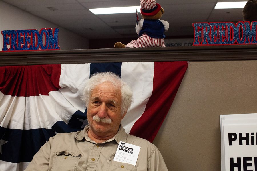 A supporter of Phil Hemingway for Johnson County Supervisor relaxes during a meet and greet at the Johnson County Republican Offices on Thursday, Aug. 30, 2018.