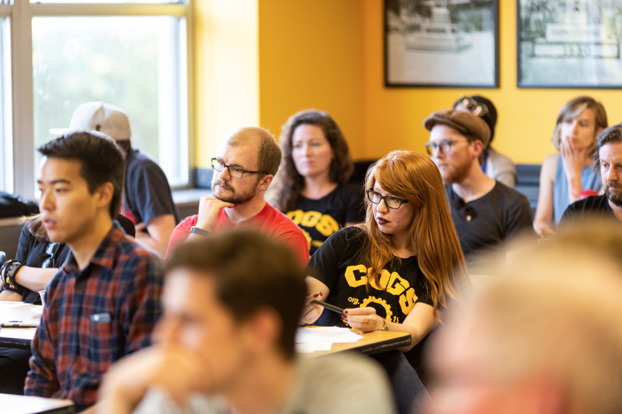 Ashley Dorn, a history graduate student and TA listens to a speaker at a meeting to discuss how to save the UI Labor Center at the IMU on Wednesday, Aug., 29, 2018.