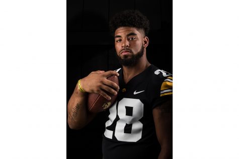 Running back Toren Young poses for a portrait during Iowa football Media Days on Friday, Aug. 10, 2018.