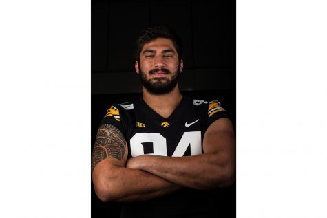 Defensive end A.J. Epenesa poses for a portrait during Iowa Football media day on Friday, Aug. 10, 2018.