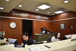 Receptionists Christian Castano and Mackenzie Goss are seen at the University Housing and Dining Administration Building on Tuesday, August 28, 2018. University Housing and Dining are in process of making changes in their Residence Education Model. 