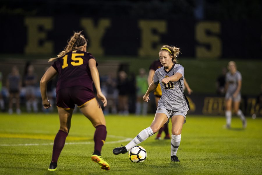 Iowa Midfielder Natalie Winters (10) plays a pass during Iowa’s game against Central Michigan on Friday, Aug. 31, 2018. The Hawkeyes defeated the Chippewas 3-1. Winters scored the Hawkeyes’ third goal on a penalty kick in the second half. (Nick Rohlman/The Daily Iowan)