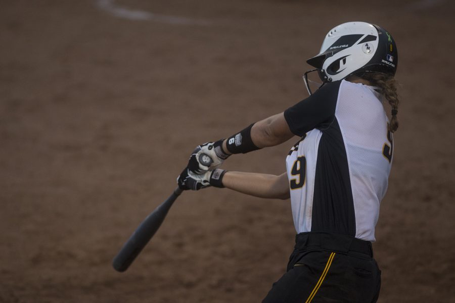Freshman+Abby+Lien%2C+utiliy+and+center%2C+bats+during+the+Iowa+v+Kirkwood+softball+game+at+the+Pearl+Softball+Complex+in+Coralville+on+Sept+14%2C+2018.+The+Hawkeyes+defeated+the+Kirkwood+Eagles+10-6.+