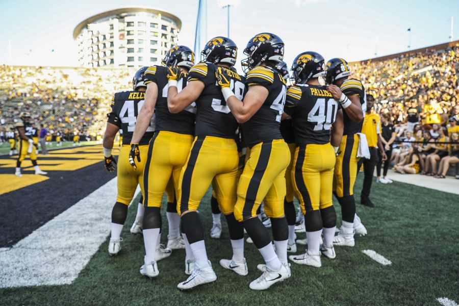 Iowa football players prepare for warm ups during the Iowa/UNI football game at Kinnick Stadium on Saturday, September 15, 2018. The Hawkeyes defeated the Panthers, 38-14. (Katina Zentz/The Daily Iowan)