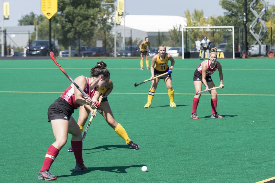 Indianas defender hits the ball out during the Iowa field hockey game on Sunday, Sept. 16, 2018. The Hawkeyes defeated the Hoosiers, 3-0, and have now won six-consecutive games.