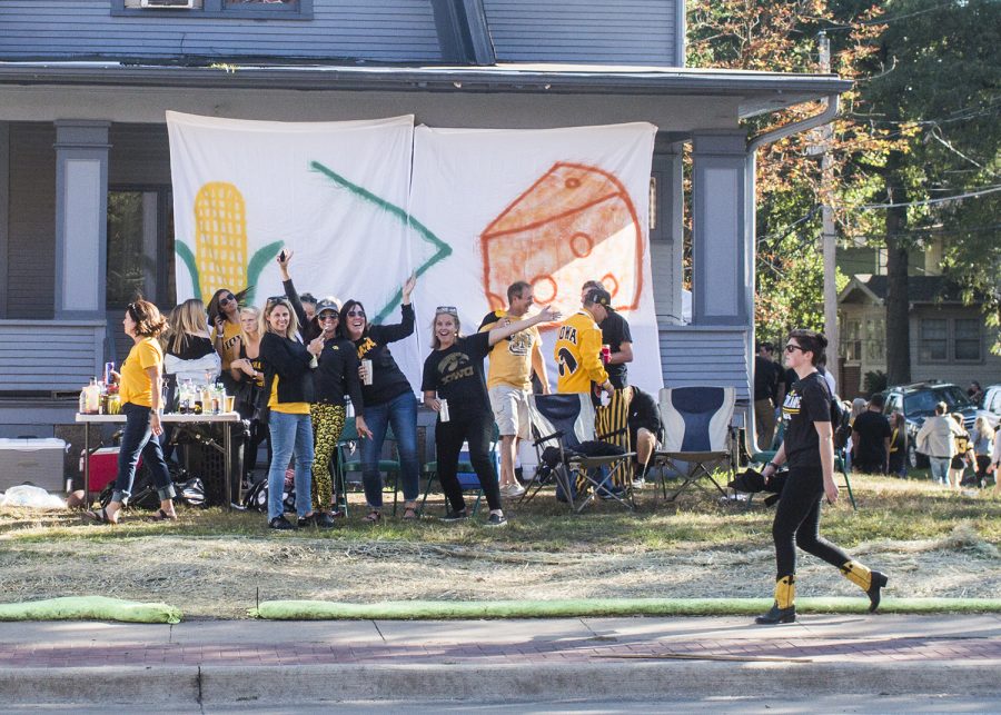 Fans cheer on Saturday, September 22, 2018. Both Hawkeye and Badger fans tailgated throughout Iowa City prior to the Iowa vs. Wisconsin  football game. (Katina Zentz/The Daily Iowan)