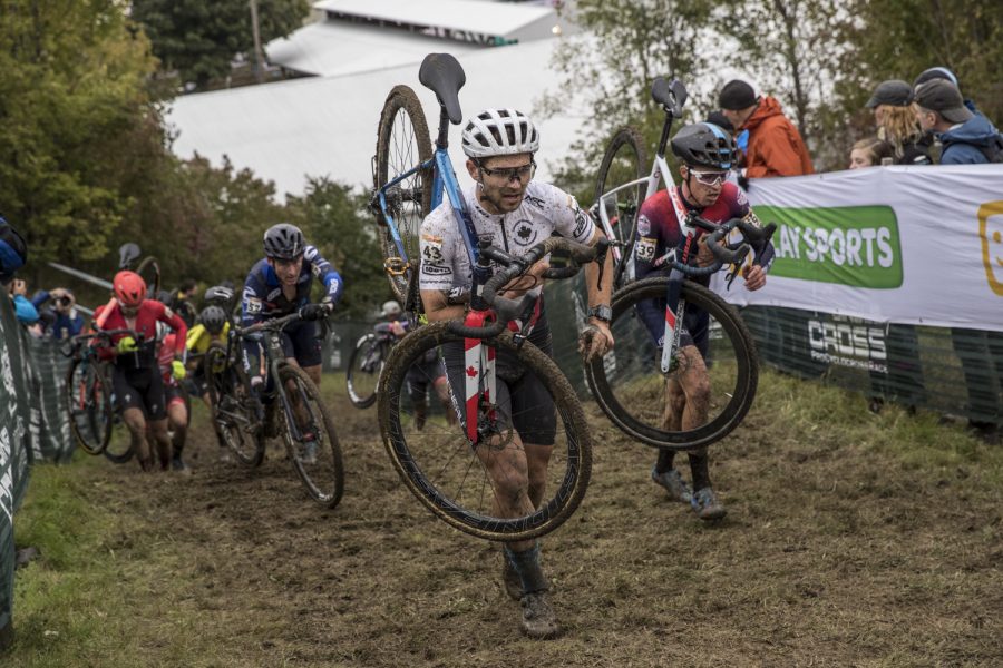 Canada's Michael Van Den Ham leads a group of riders over the crest of a steep climb during the UCI Elite Cyclo-Cross World Cup at the Jingle Cross Cyclo-Cross festival on Saturday, September 29, 2018. Belgium's Toon Aerts won the men's event while American Katlin Keough won the women's race.