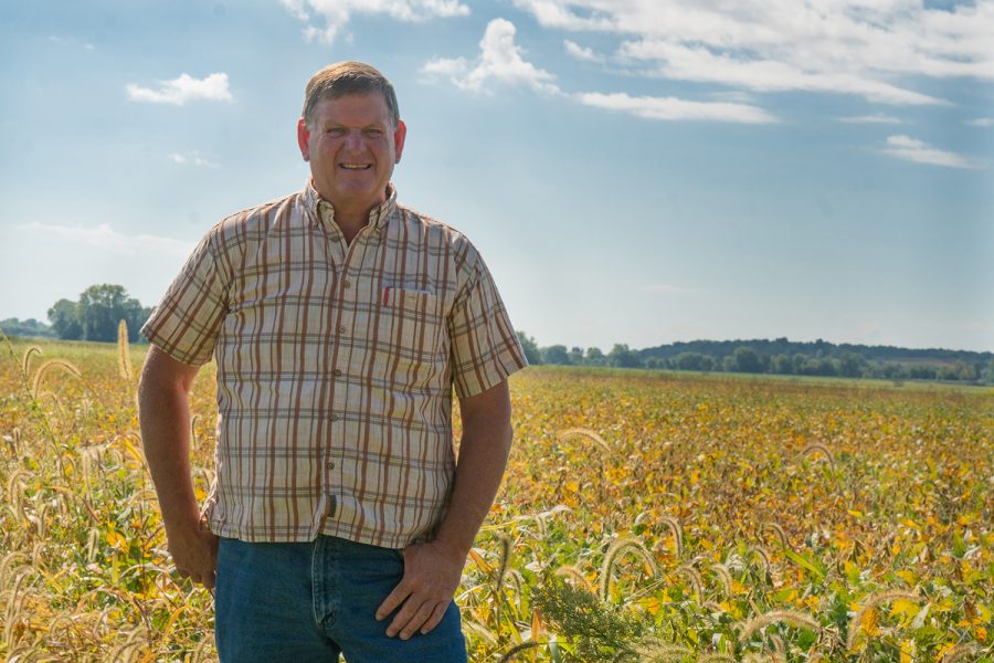 Kevin Kinney stands in a field on Sept. 14, 2018 in Iowa City outside of Midtown Family Restaurant.