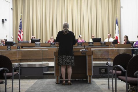 Iowa City sustainability coordinator Brenda Nations addresses the City Council on Tuesday in City Hall. By a 6-0 vote, the council adopted the Climate Action Plan, which aims to significantly reduce greenhouse-gas emissions.