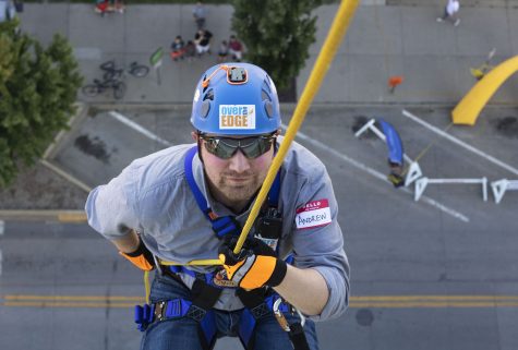Andrew Sciranko, a participant in Over the Edge, rappels down the side of hotelvetro on Sept. 14. 